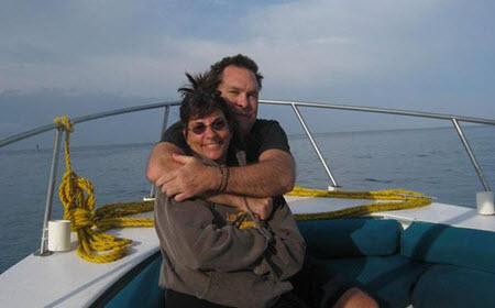 Couple Enjoying Private Boat Charters Couple Enjoying Private Boat Charters