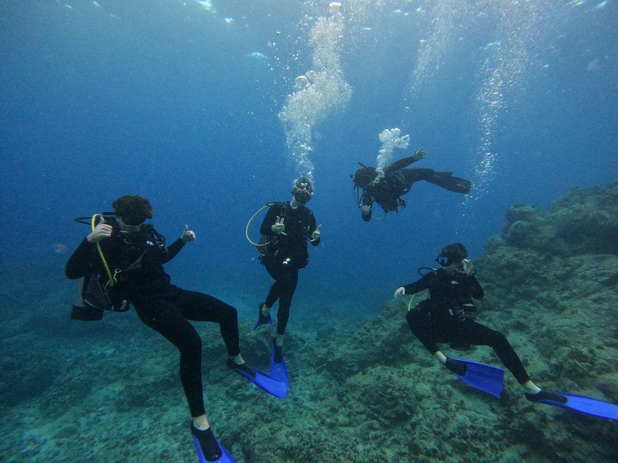 DCIM100GOPROGOPR1271.JPG A family SCUBA diving together on a Kona Ocean Adventures SCUBA tours.