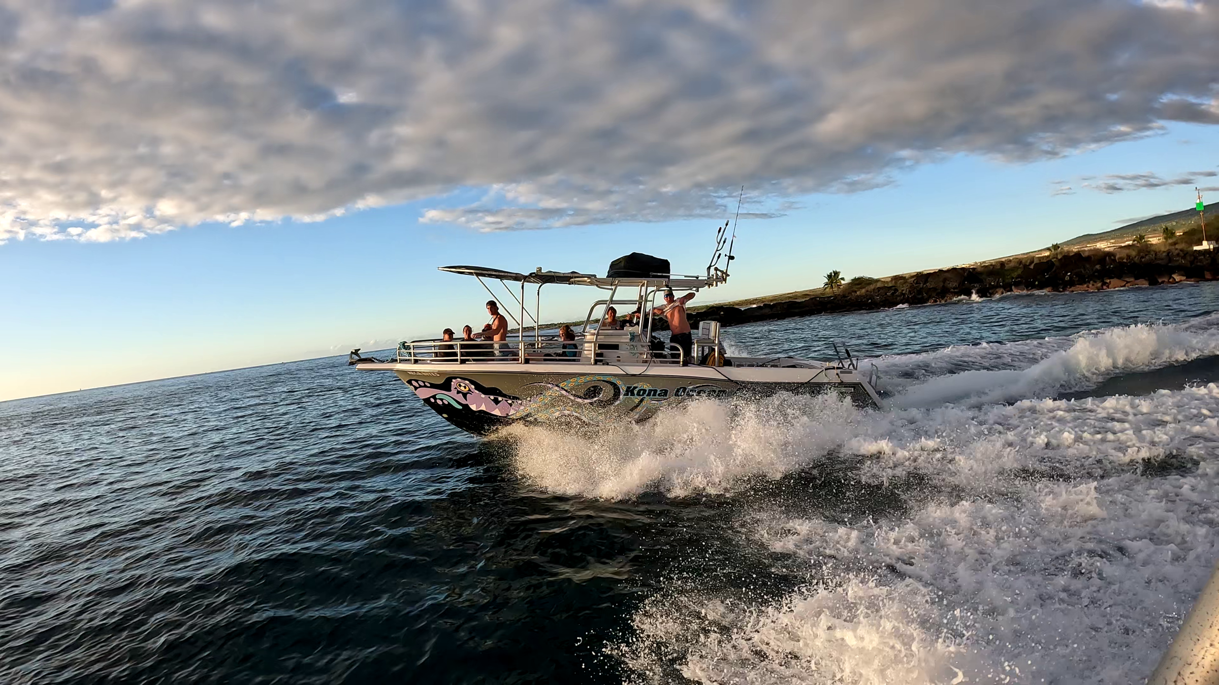 Our luxury private boat charter driving on the water in Kona, Hawaii.
